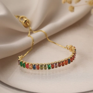 Adjustable gold plated bracelet with colorful rectangular zircons on velvet silk