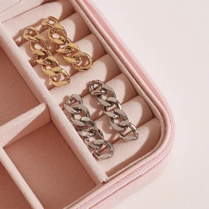 Elegant gold and silver chain tassel earrings in a pink jewelry box, stainless steel style