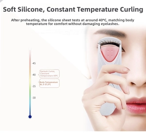 Electric eyelash curler with constant 40°C heat and pink silicone pad for safe styling