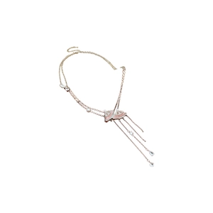 Rose gold necklace with pink fan pendants and tassel zircon drops on white background