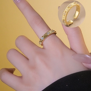 Vintage gold textured ring with sparkling zircon inlays and adjustable band design