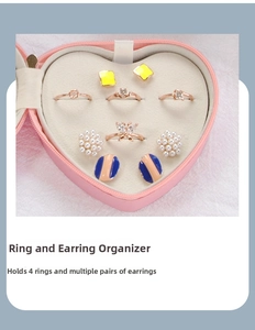Internal view of heart jewelry box with slots for rings and earrings storage