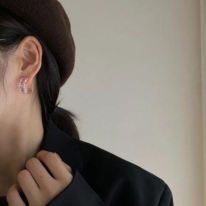 Elegant S925 sterling silver C-shaped hoop earrings with square pink zircon on model