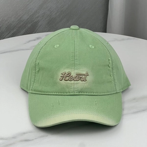 Distressed green baseball cap with Heart embroidery and vintage ripped details