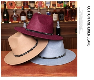 Detail of wool fedora hats with rhinestone bands in wine red, camel, and light blue