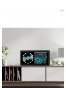 Detail of a black solid wood frame displaying a vinyl record and custom text insert