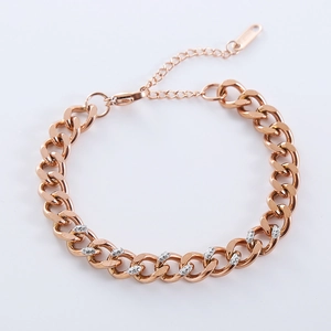Rose gold Cuban link bracelet with white zircon inlays and adjustable extender chain