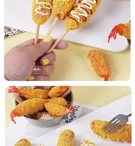 Detailed view of artificial fried shrimp and hot dog props with realistic breadcrumb texture
