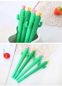 Detailed view of cactus-shaped gel pens with pink and yellow flower caps in a white pot