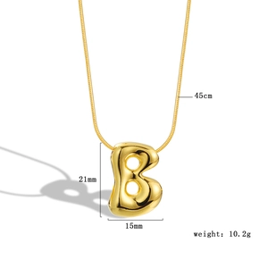 Macro view of gold puffy letter B pendant showing 21mm size and 45cm chain length specs