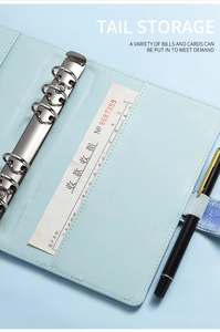 Detail of A6 macaron PU leather binder featuring 6-hole metal rings and pen holder