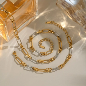 Two-tone gold and silver stainless steel chain necklace set in spiral layout