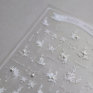 Lace flower and butterfly nail art stickers with 3D pearl accents and French motifs