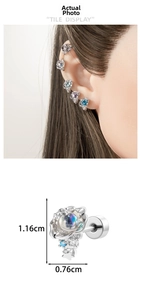 Detail view of marine style floral cartilage studs showing 1.16cm x 0.76cm dimensions