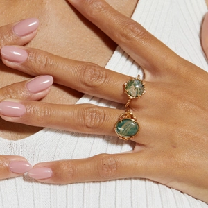 S925 silver plated gold ring set featuring natural green moss agate on model hand