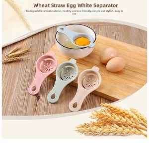 Close-up of eco-friendly wheat straw egg separators in four pastel colors on wood