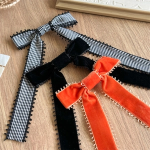 Barrettes à nœuds d'Halloween avec longs rubans en velours noir, orange et carreaux