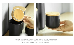 Detail of black ceramic storage jars with bamboo lids and airtight seal rings