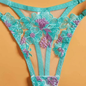 Turquoise lace embroidery bra set featuring purple floral patterns and mesh details