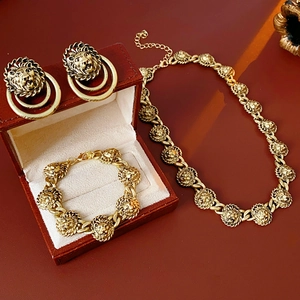 Parure bijoux vintage tête de lion dorée avec collier, bracelet et boucles d'oreilles