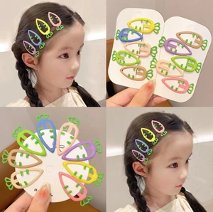 Colorful candy-colored carrot hair clips for girls shown on models and in packaging