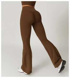 Detail view of high waisted flared yoga pants featuring back scrunch and lift design