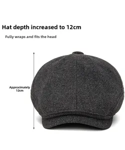 Detail view of dark grey wool newsboy cap showing a deep fit crown of 12cm for extra warmth