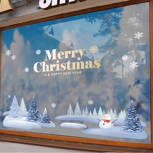 White Christmas snowflake window stickers with snowman and Merry Christmas lettering