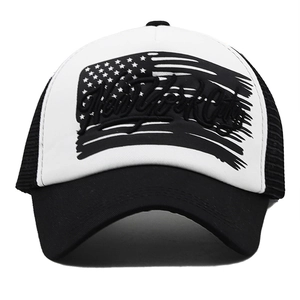 Detail of New York City embroidery and American flag patch on mesh trucker cap