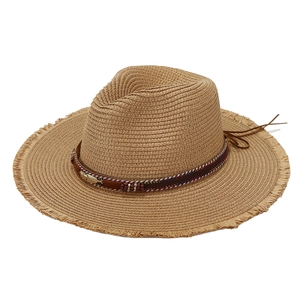 Ethnic style straw sun hat with decorative feather band and frayed brim for beach vacation