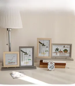 Detail of wooden multi-frame combination in Nordic style with 4x6 inch photo slots