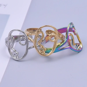 Abstract face line art open rings in silver, gold, and rainbow polished stainless steel