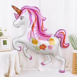 Detail of a 3D standing silver unicorn foil balloon with colorful mane and floral patterns