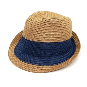 Close-up of the two-tone straw fedora with natural fiber weave and navy blue band