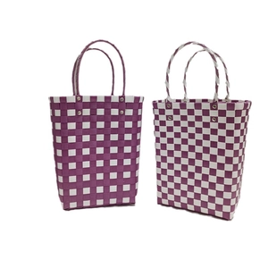 Handwoven purple and white checkered bucket bags in two sizes with reinforced handles