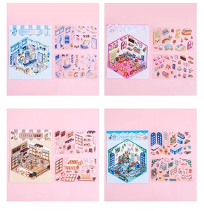 Close-up of 3D PET miniature house stickers featuring bakery and coffee shop scenes