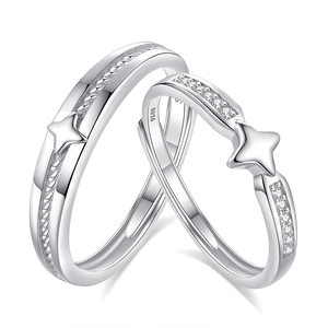 Sparkling S925 sterling silver couple rings with star design and zircon inlay on white base
