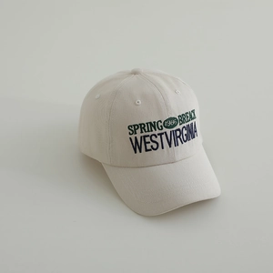Close-up of vintage cotton baseball cap with retro 1986 letter embroidery detail