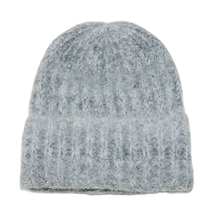 Close-up of the plush ribbed knit texture on a light gray winter beanie for women