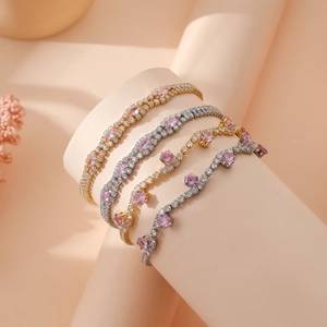 Elegant adjustable tennis bracelets with pink crystals and zircon in gold and silver finish