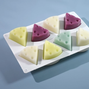Detailed view of 8-cavity triangle cheese silicone mold for cake and DIY resin crafting