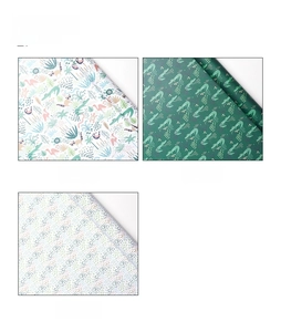 Detail showing Jungle Cartoon and Crocodile pattern designs on gift wrapping paper