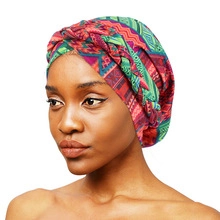 Detail of bohemian geometric print turban cap with colorful patterns for yoga and chemo