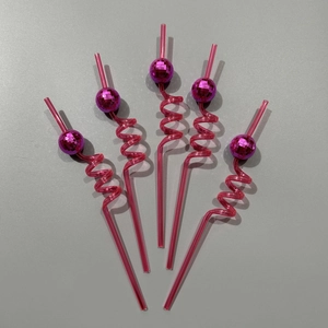 Pink disco ball straws in a fan arrangement for party table decorations set of five