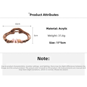 Detail view of 11x5cm acrylic leopard print hair claw with pink puppy motif design