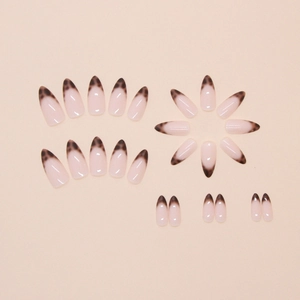 Pink press-on nails with leopard print French tips in 24-piece long stiletto shape