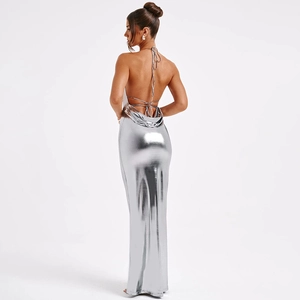 Detail of silver metallic backless maxi dress with cross-tie straps and slim fit design