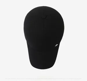 Top view of a black wool baseball cap with thermal lining and white planet embroidery