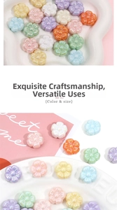 Macro view of macaron-colored acrylic flower beads in a white ceramic dish