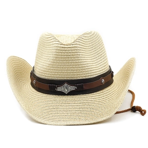 Detail view of woven straw cowboy hat with leather band and vintage metal ornaments